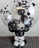 COLLECTION ONLY - Black & White Twisted Tower Topped with a Clear Bubble filled with Balloons & Black Confetti - Black Message