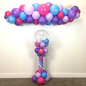 COLLECTION ONLY - Pink, Purple & Blue Twisted Tower Topped with a Clear Bubble filled with Balloons  - White Logo + 1 Garland