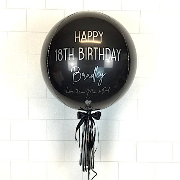 COLLECTION ONLY - Black Orbz Balloon, Personalised with a Silver Message Dressed with Tassel, Bow & Weight