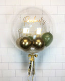 COLLECTION ONLY - Clear Bubble Balloon - Green, Gold & Cream Balloons - Gold Message + 2 Clusters