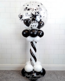 COLLECTION ONLY - Black & White Twisted Tower Topped with a Clear Bubble filled with Balloons & Black Confetti - Black Message