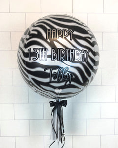 COLLECTION ONLY - Zebra Orbz Balloon, Personalised with a Black & Silver Message Dressed with Tassel, Bow & Weight