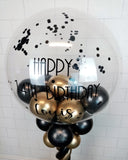 COLLECTION ONLY - Black & Gold Twisted Tower Topped with a Clear Bubble filled with Balloons - Black Message