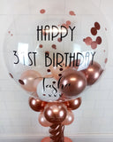COLLECTION ONLY - Rose Gold Twisted Tower Topped with a Clear Bubble filled with Balloons & Confetti - Black Message