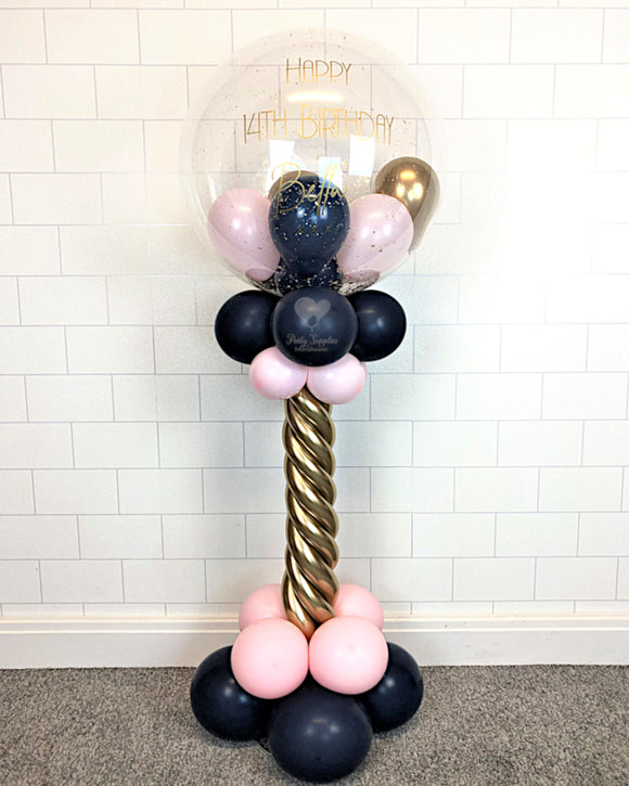 COLLECTION ONLY - Pink, Navy & Gold Twisted Tower Topped with a Clear Bubble filled with Balloons & Gold Leaf - Gold Message