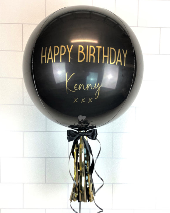 COLLECTION ONLY - Black Orbz Balloon, Personalised with a Gold Message Dressed with Tassel, Bow & Weight