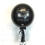 COLLECTION ONLY - Black Orbz Balloon, Personalised with a Silver Message Dressed with Tassel, Bow & Weight