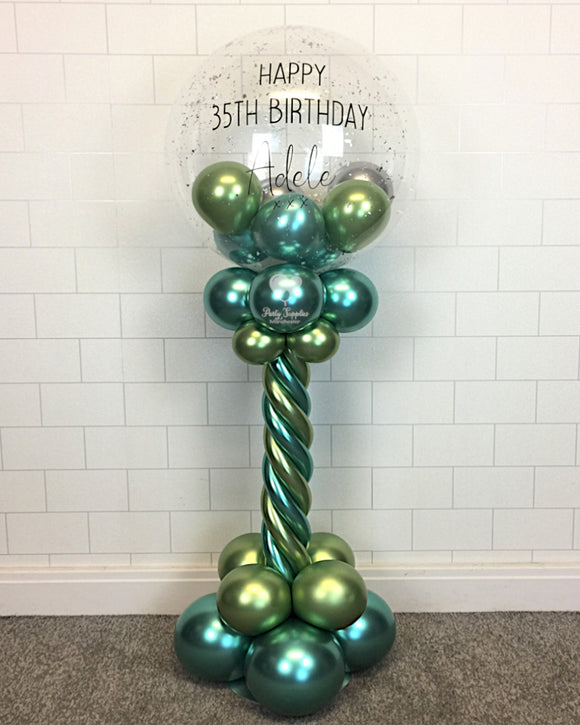 COLLECTION ONLY - Green & Silver Twisted Tower Topped with a Clear Bubble filled with Balloons & Silver Leaf - Black Message