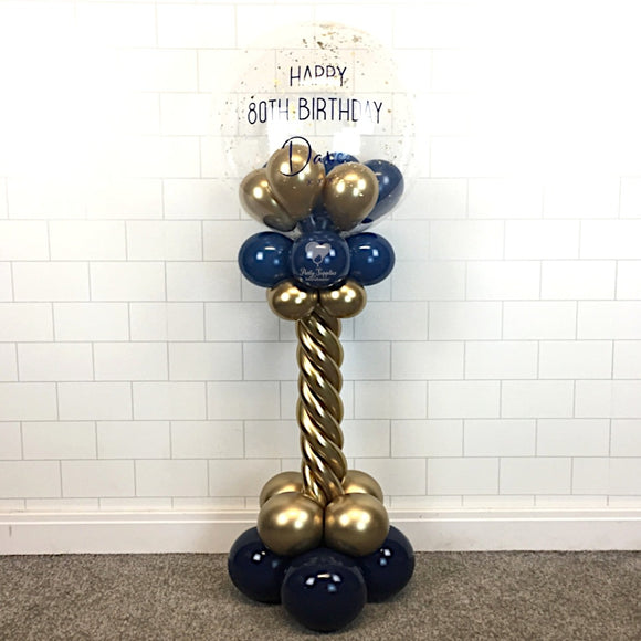 COLLECTION ONLY - Navy & Gold Twisted Tower Topped with a Clear Bubble filled with Balloons & Gold Leaf - Blue Message